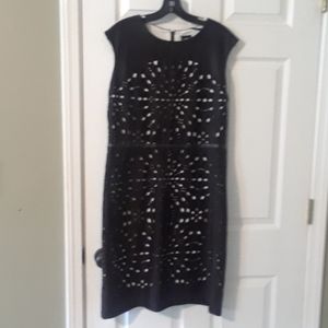 Black geometric hole pattern dress